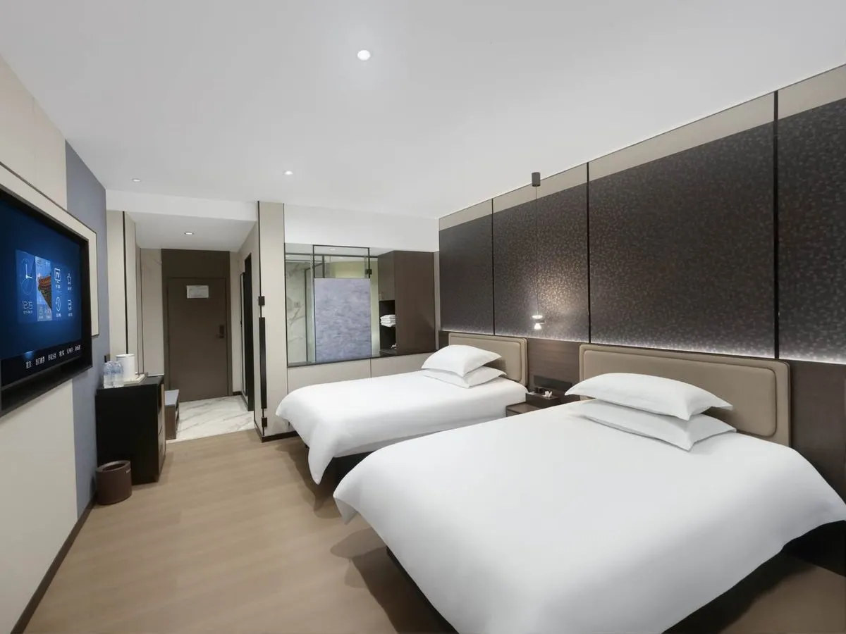Yongping Xinli Da Grand Hotel